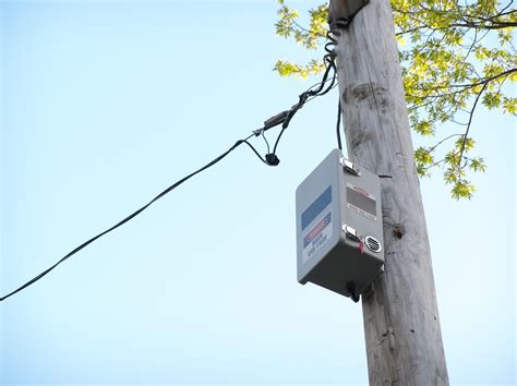 black box on electric poles|box on utility pole.